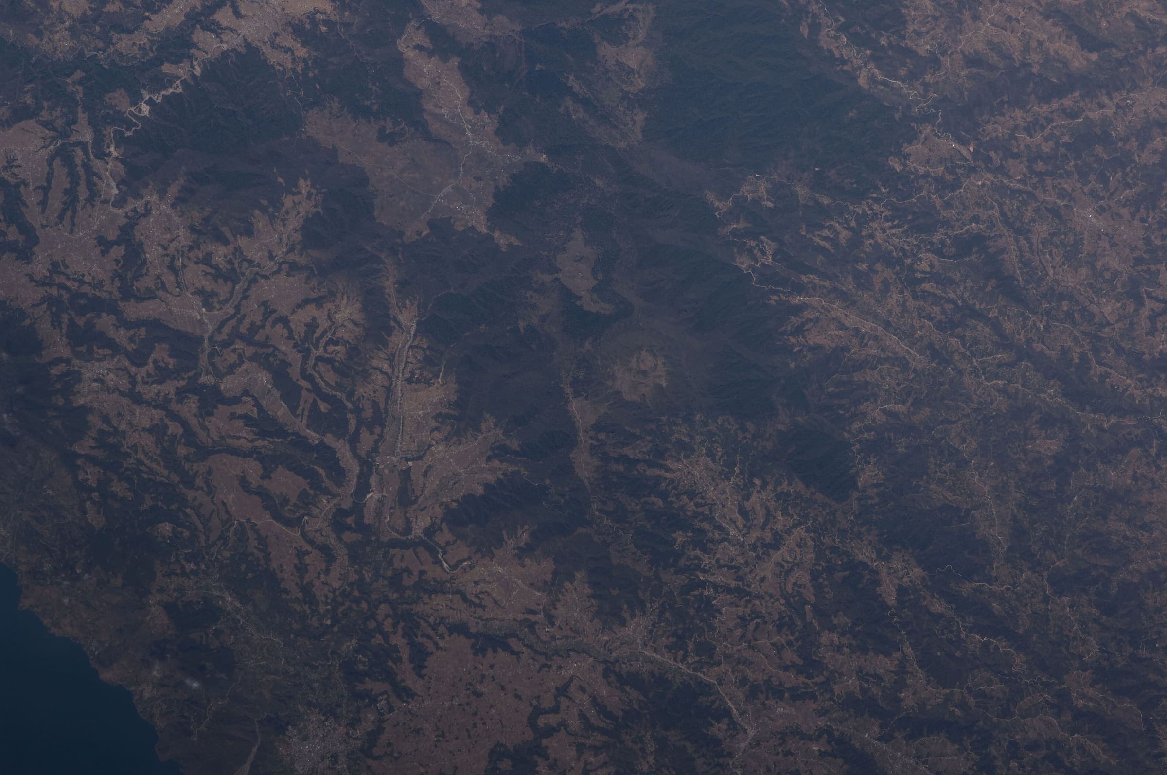 Lake Atitlán volcanic country from orbit, Guatemala
