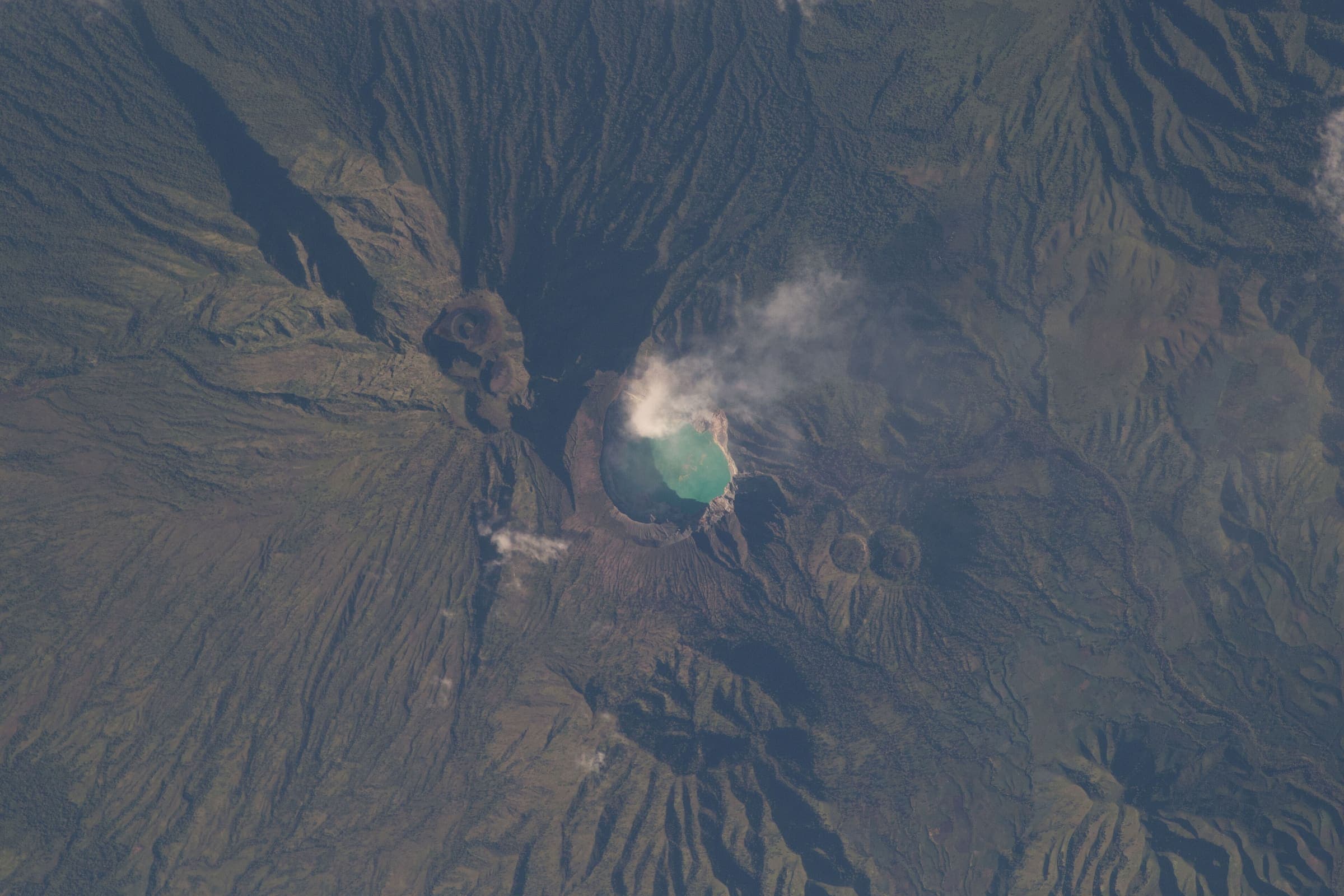 Lombok volcanic country around Mount Rinjani from orbit, Indonesia