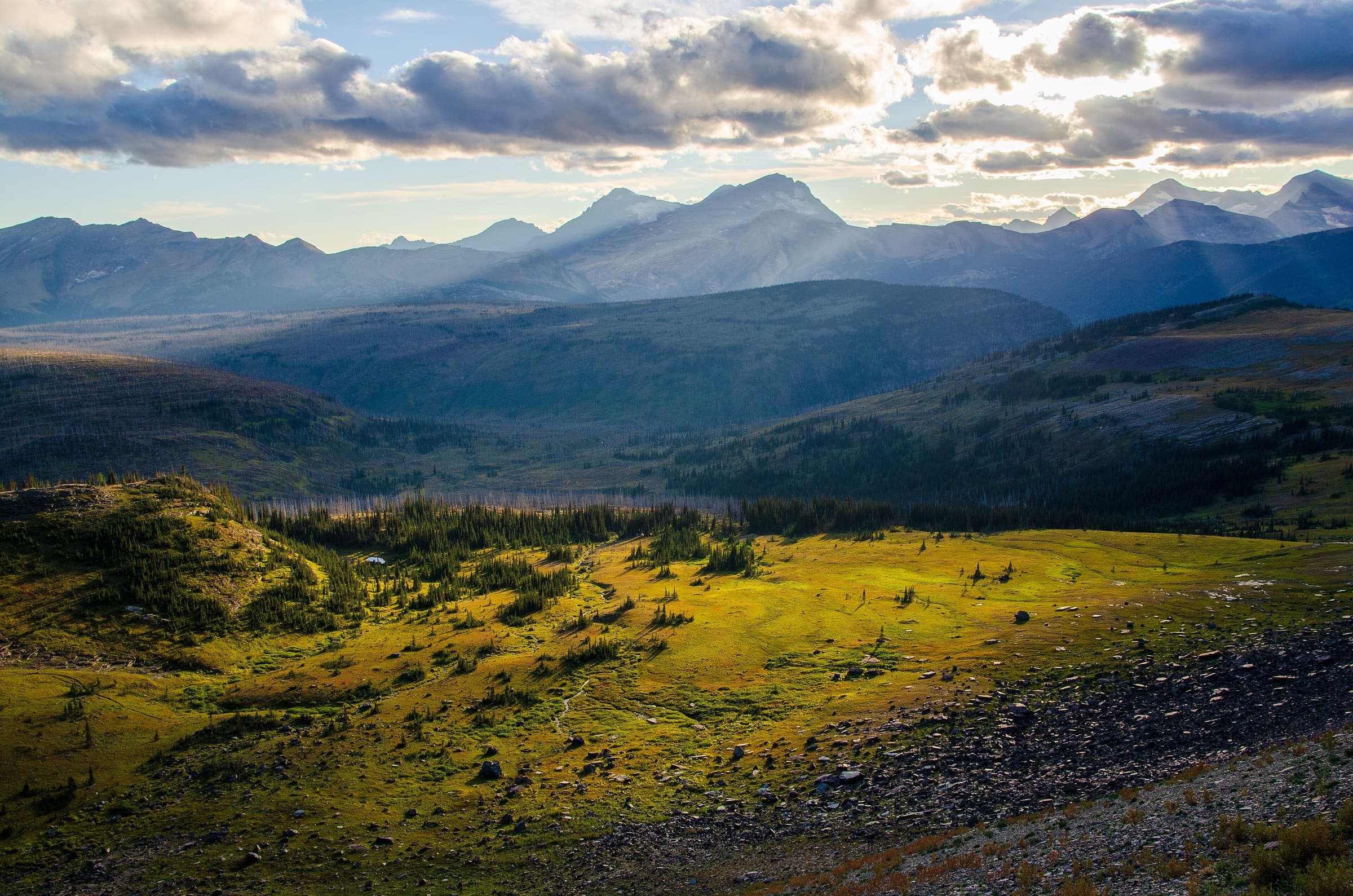 Sunset at a mountain meadow along a walking trail