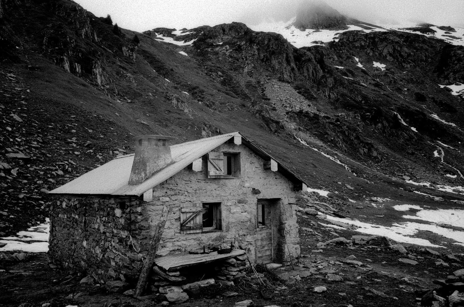 Alpine chalet in mountain pasture